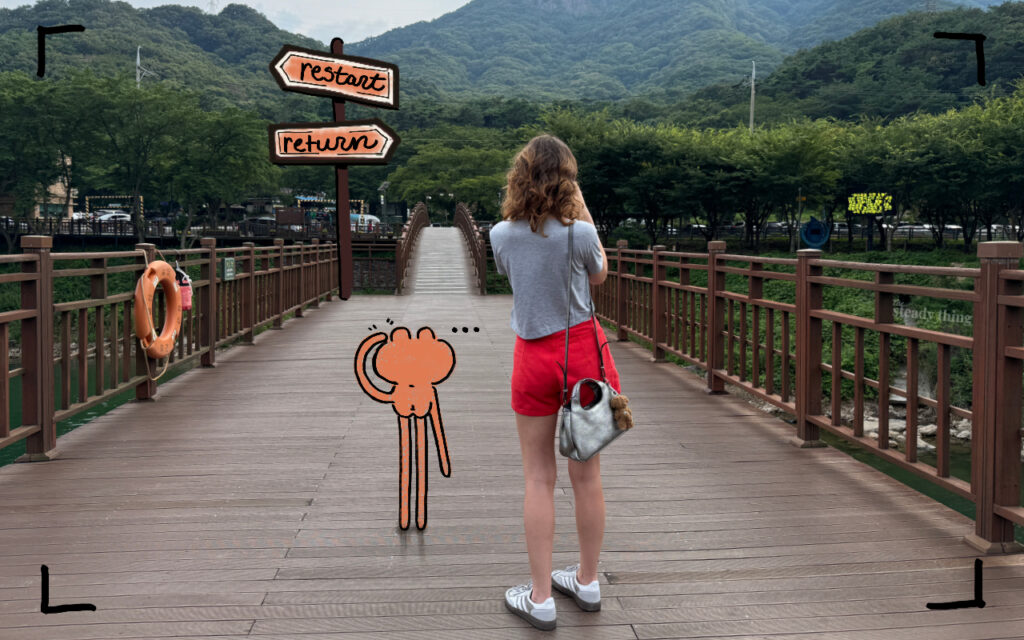 person standing at a crossroads path looking forward