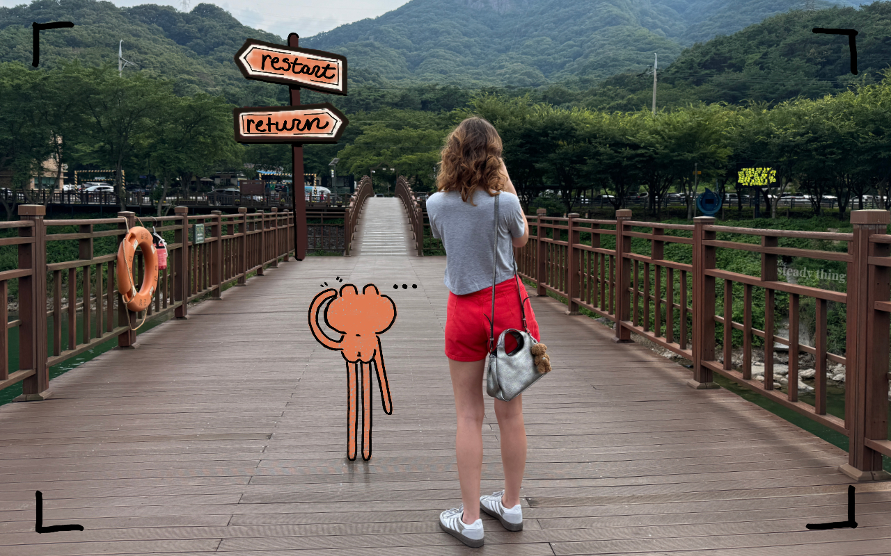 person standing at a crossroads path looking forward